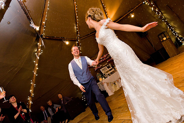 Big grins on our first dance couple